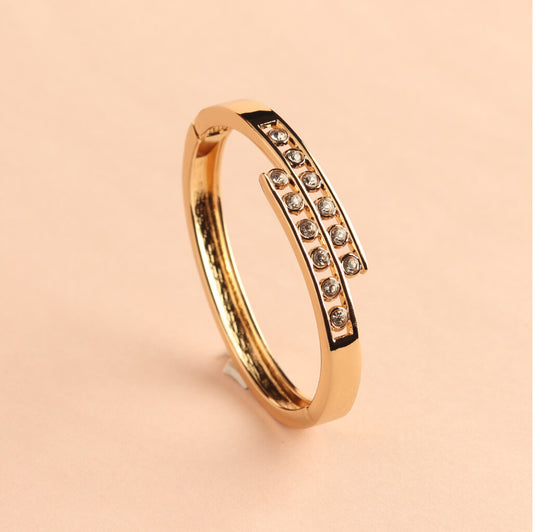 Gold-Tone Hinged Bracelet with Double Row Crystals
