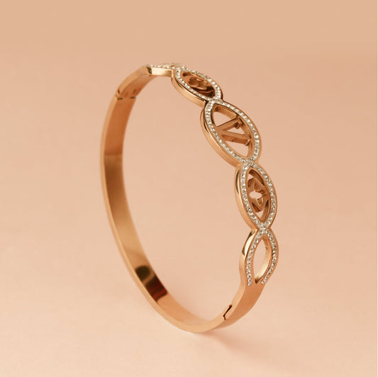 Infinity Luxe Gold Bracelet with Diamond Motifs