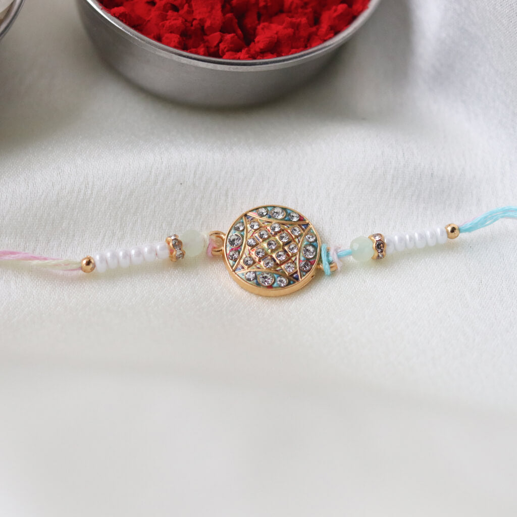 Pastel Mandala Rakhi – A Thread of Harmony & Light