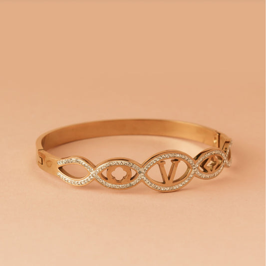 Infinity Luxe Gold Bracelet with Diamond Motifs